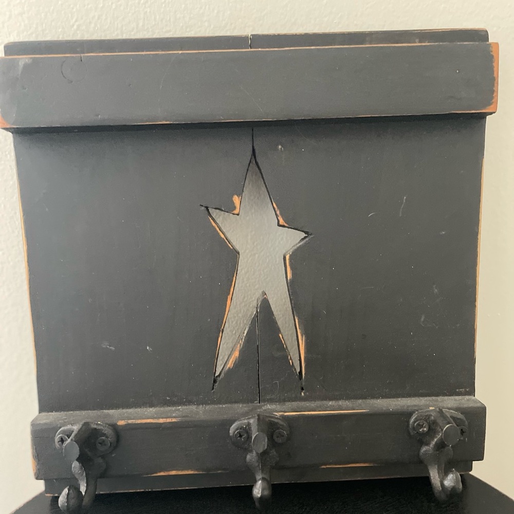 Primitive wall hanger for keys or other objects.
